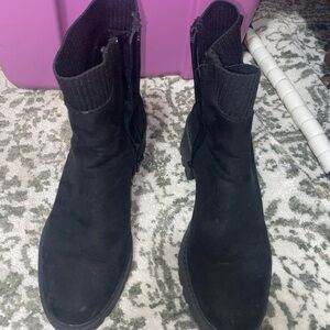 Black heeled boots.
